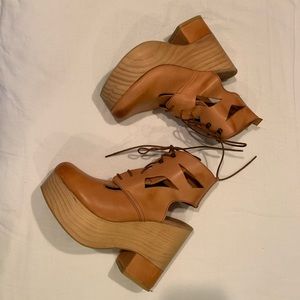 Free People clogs with leather cut outs and laces